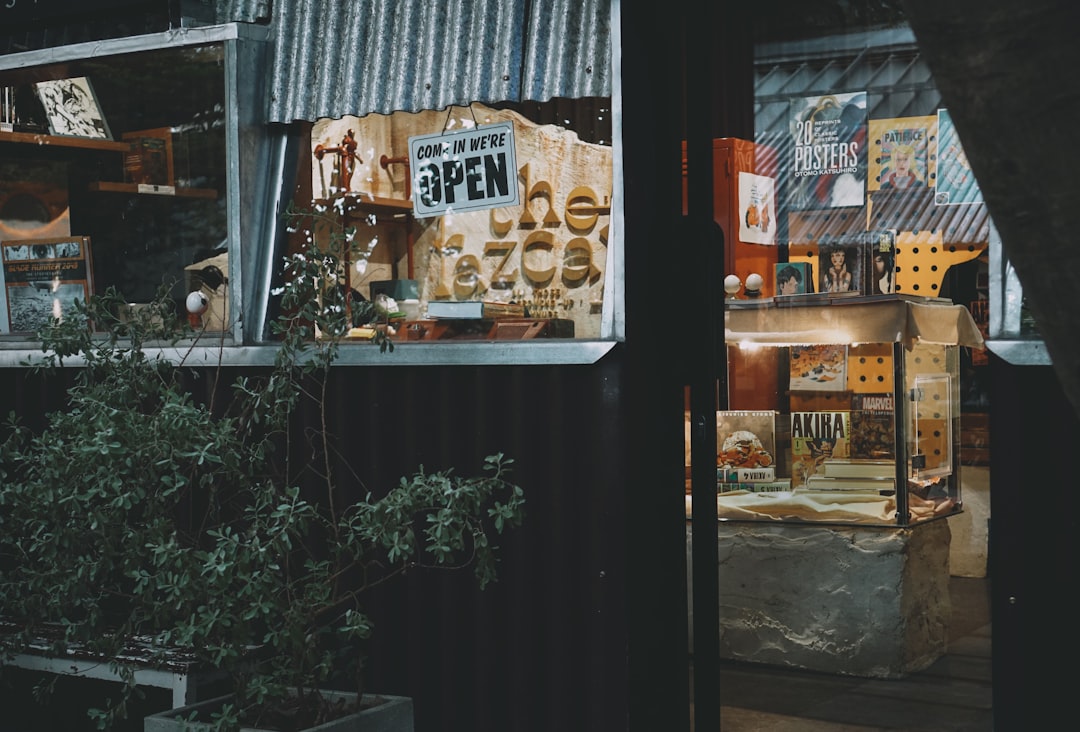 a-store-front-with-signs-8gc233c-vga